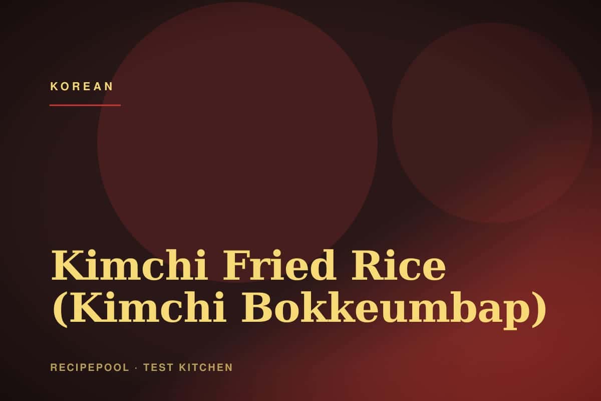 Bowl of kimchi fried rice topped with a fried egg and sesame seeds