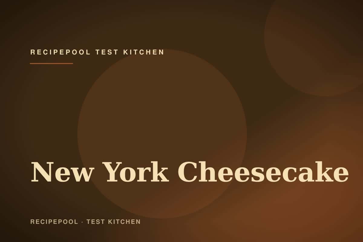 Tall New York cheesecake with smooth top on a cake stand