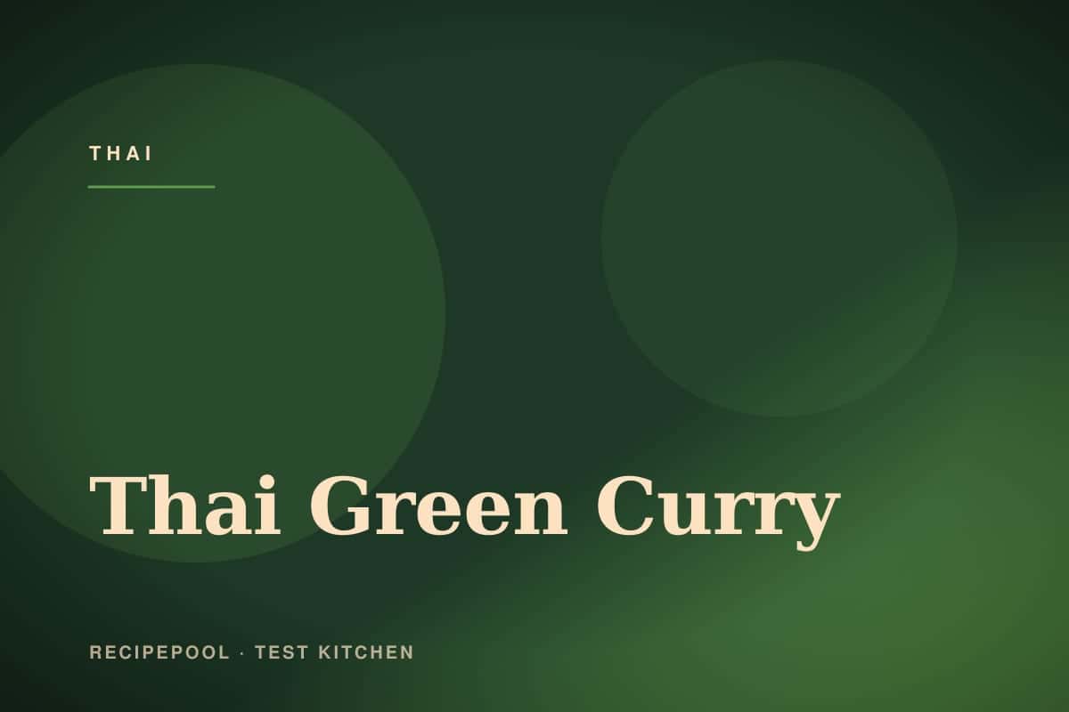 Bowl of vibrant Thai green curry with chicken, basil, and vegetables over jasmine rice