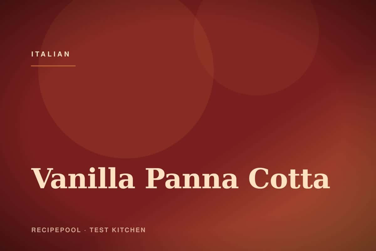 Vanilla panna cotta unmolded on a plate with fresh berry compote