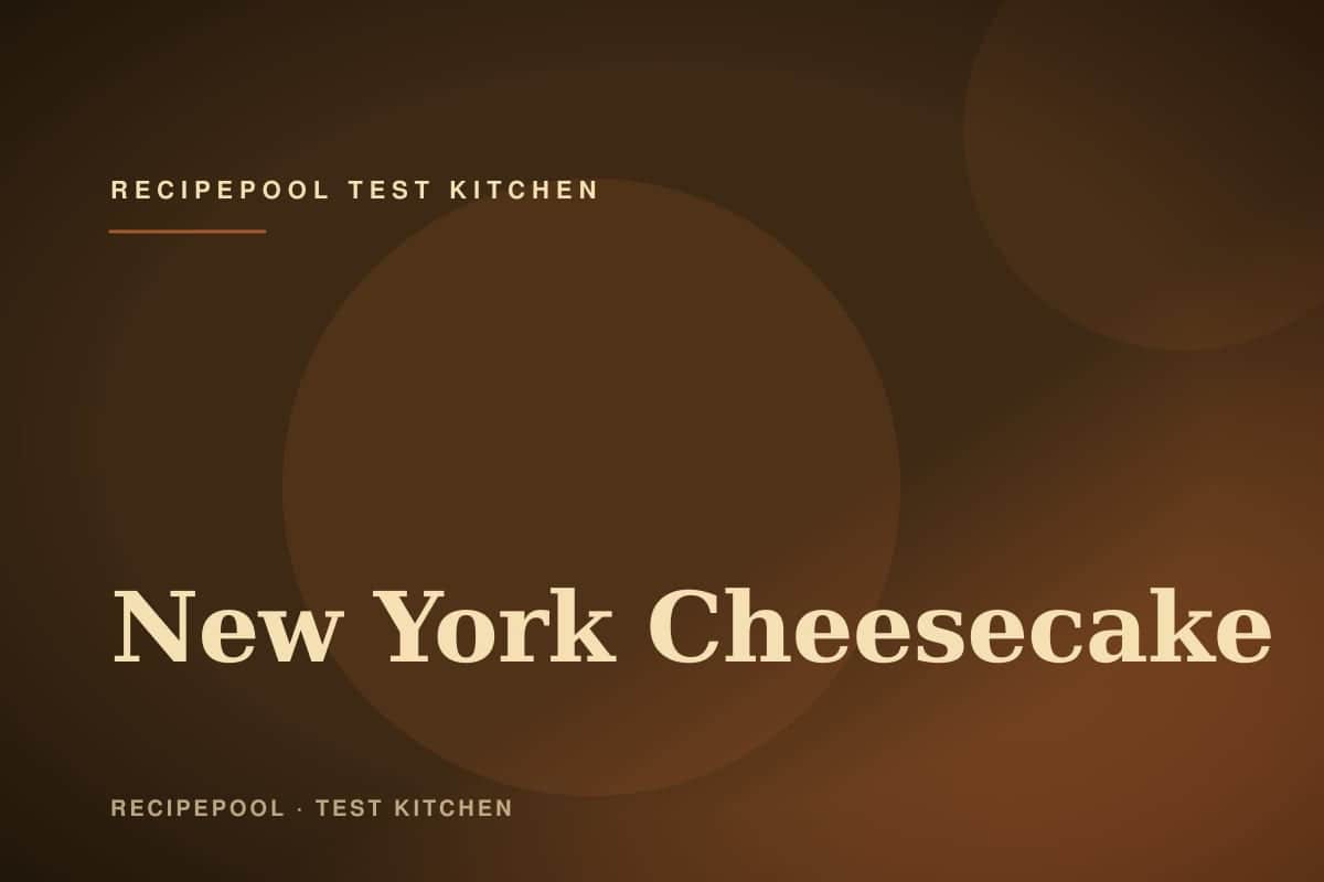 Tall New York cheesecake with smooth top on a cake stand
