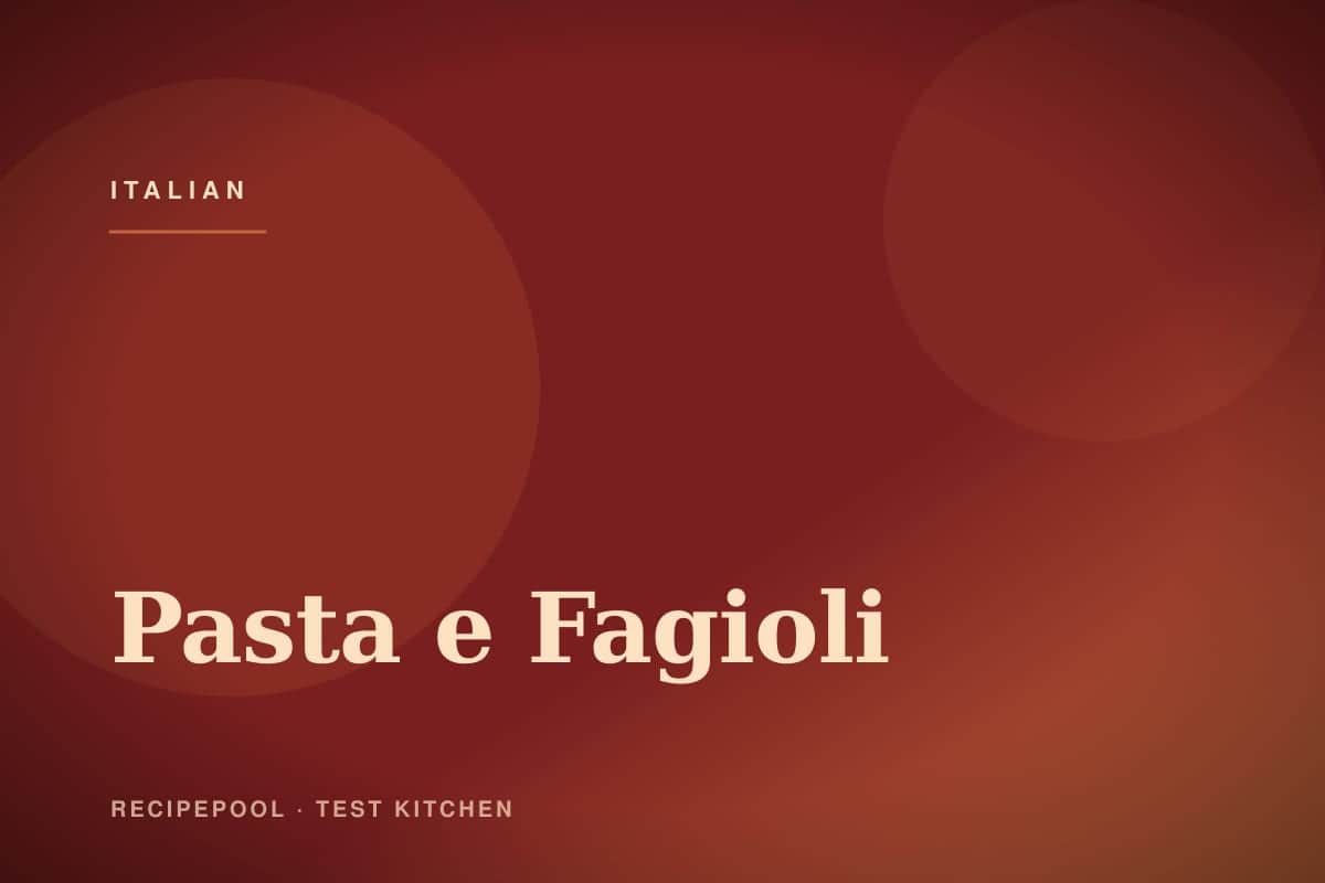 Bowl of pasta e fagioli soup with small pasta, beans, and a drizzle of olive oil
