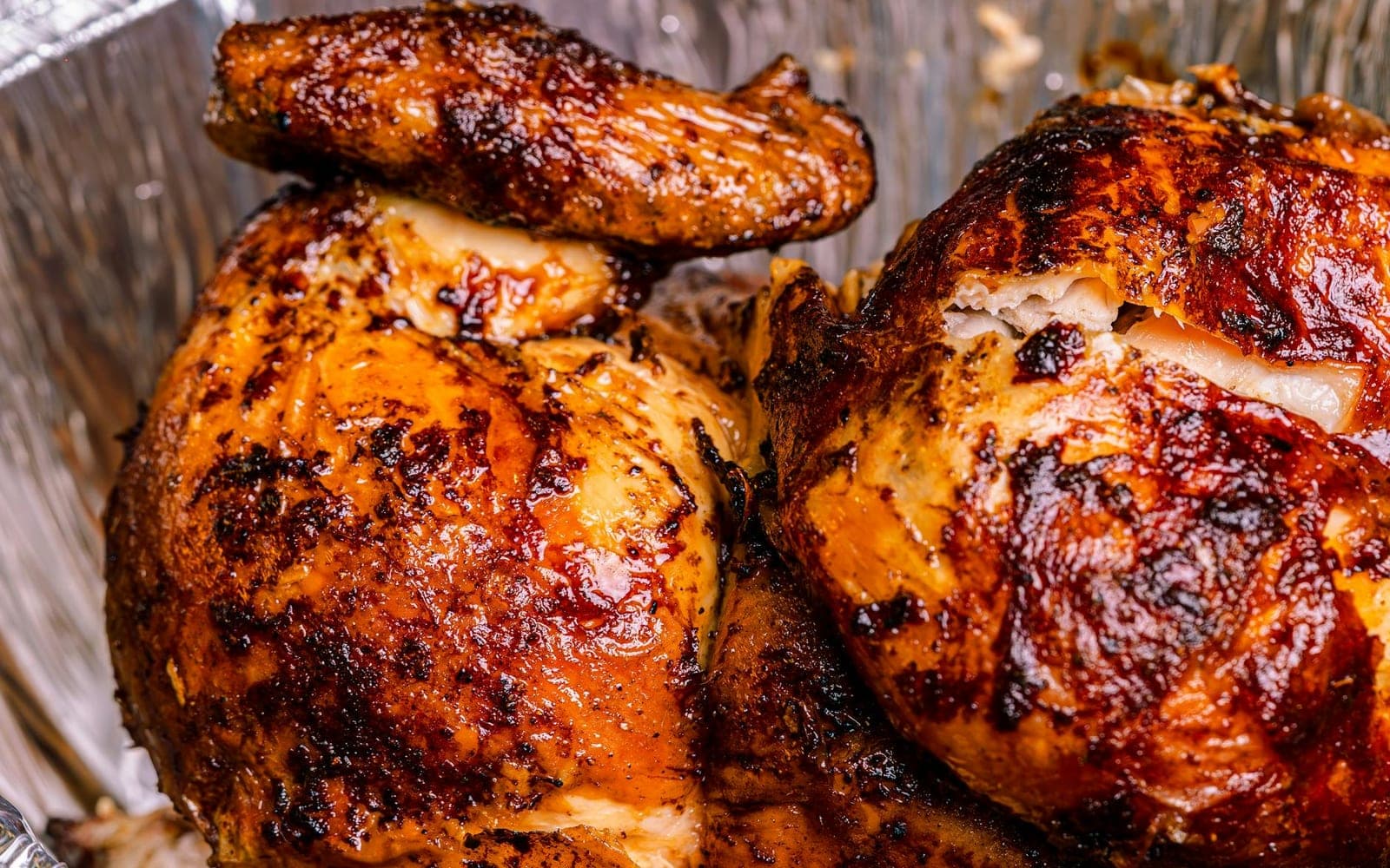 Beer can chicken-style roasted whole chicken with crisp browned skin