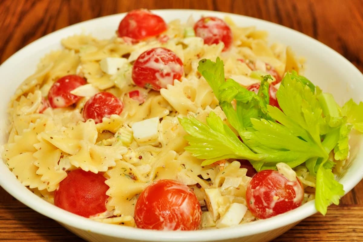 Caprese-style pasta salad with tomatoes, mozzarella, basil, and pasta