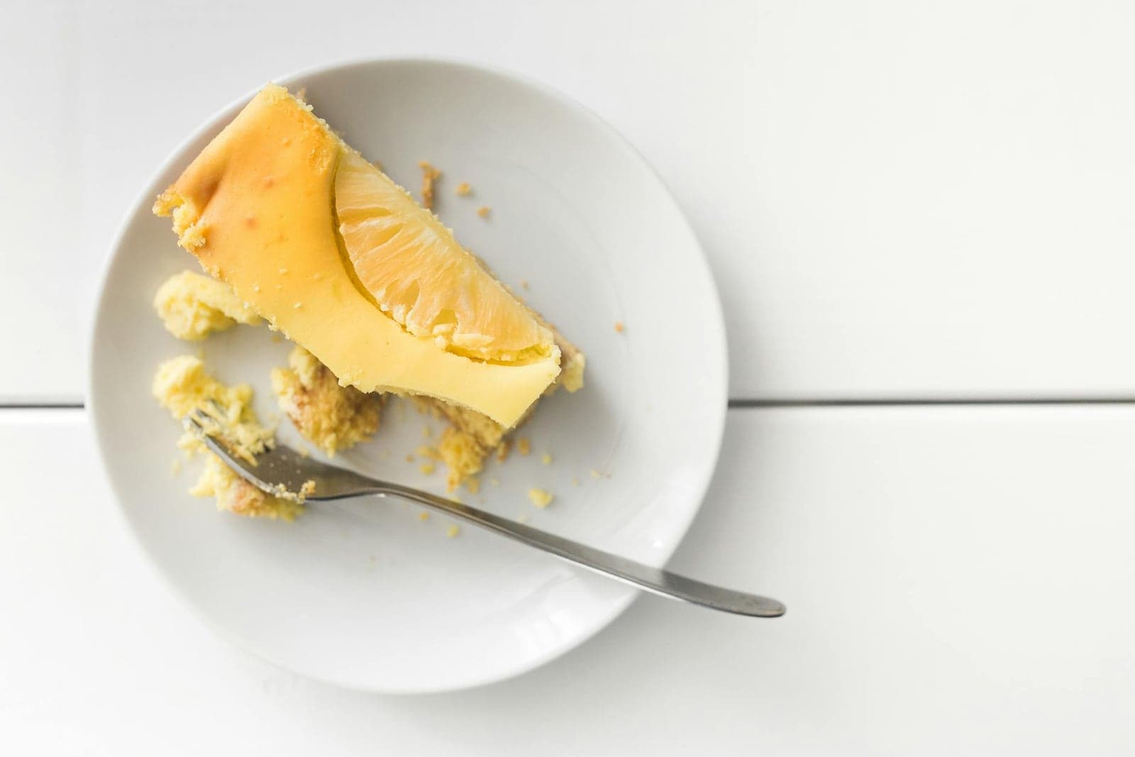 Japanese cheesecake-style slice on a white plate with a light airy crumb