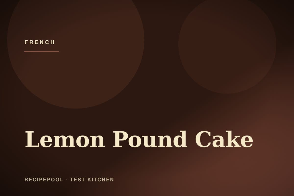 Sliced lemon pound cake with lemon glaze on a rustic cutting board