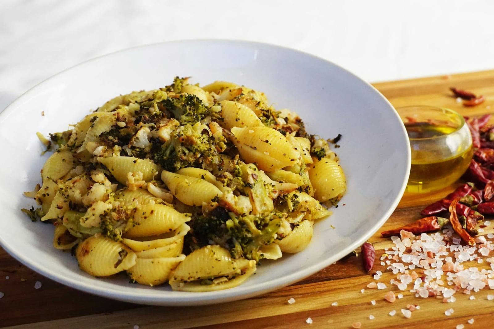 Roasted broccoli pasta salad with short pasta, broccoli, olive oil, and spices