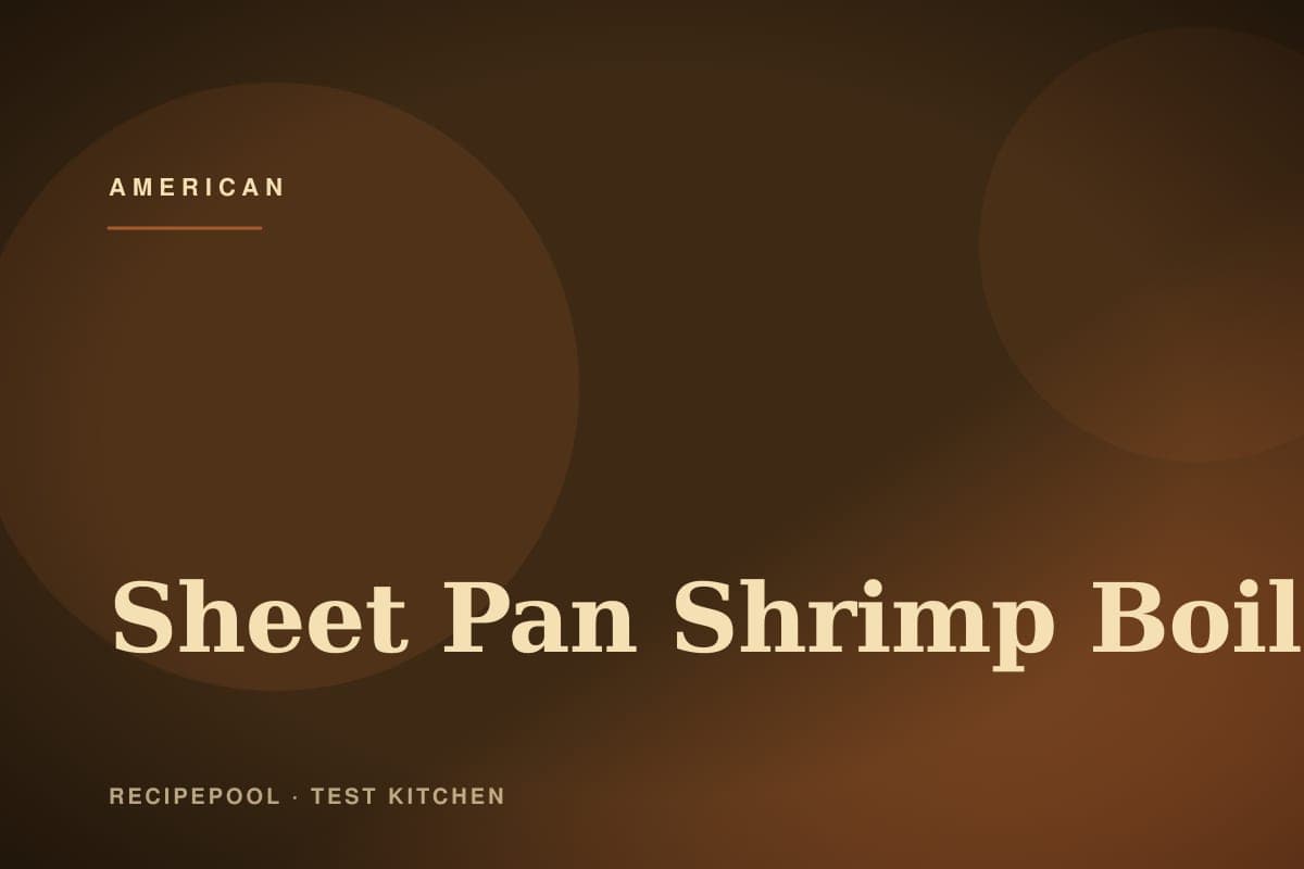 Sheet pan shrimp boil with corn, sausage, potatoes, and lemon wedges