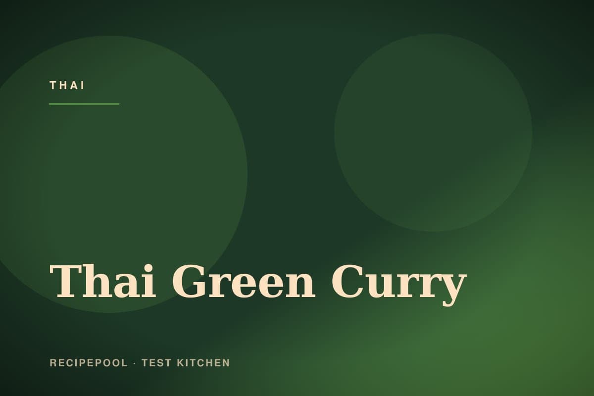 Bowl of vibrant Thai green curry with chicken, basil, and vegetables over jasmine rice