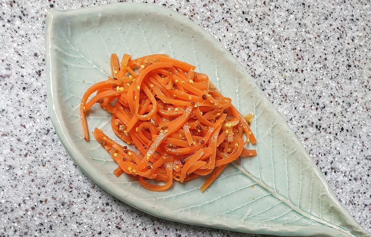French carrot salad with parsley in a bowl