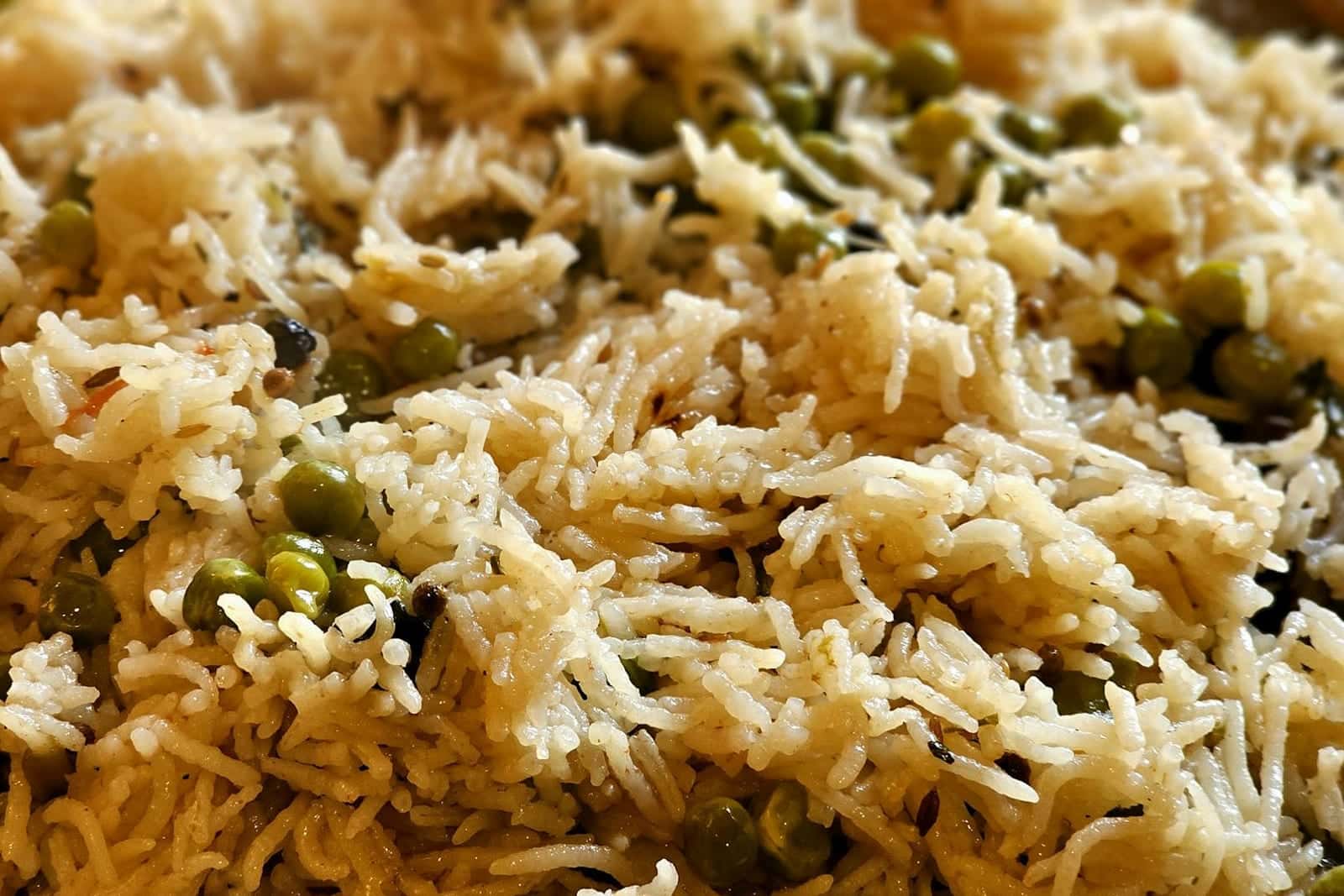 Arabic rice with vermicelli-style pilaf, basmati grains, peas, and toasted noodles