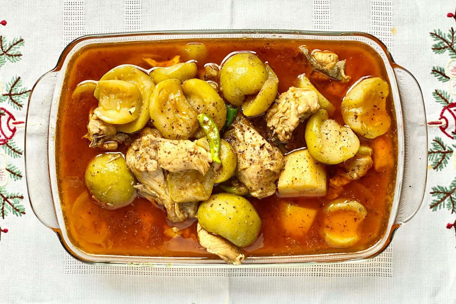 Ethiopian doro wat-style chicken stew in a red sauce with potatoes and aromatic spices