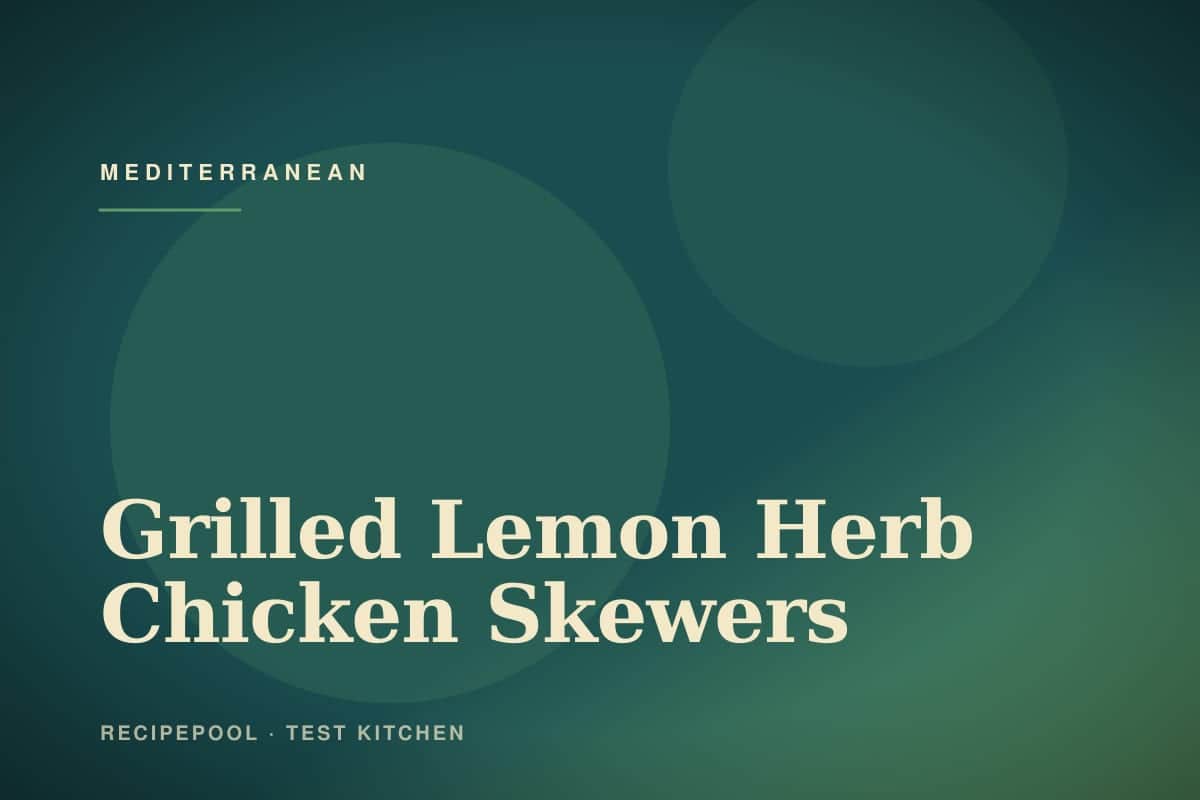 Grilled lemon herb chicken skewers on a platter with lemon wedges and fresh herbs