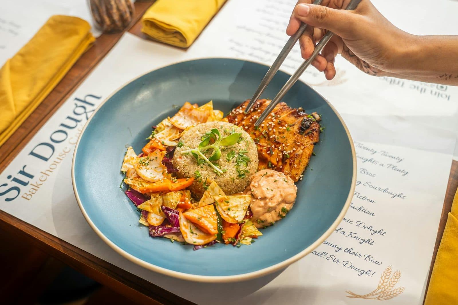 Roasted salmon quinoa salad with vegetables and a fresh lemony finish