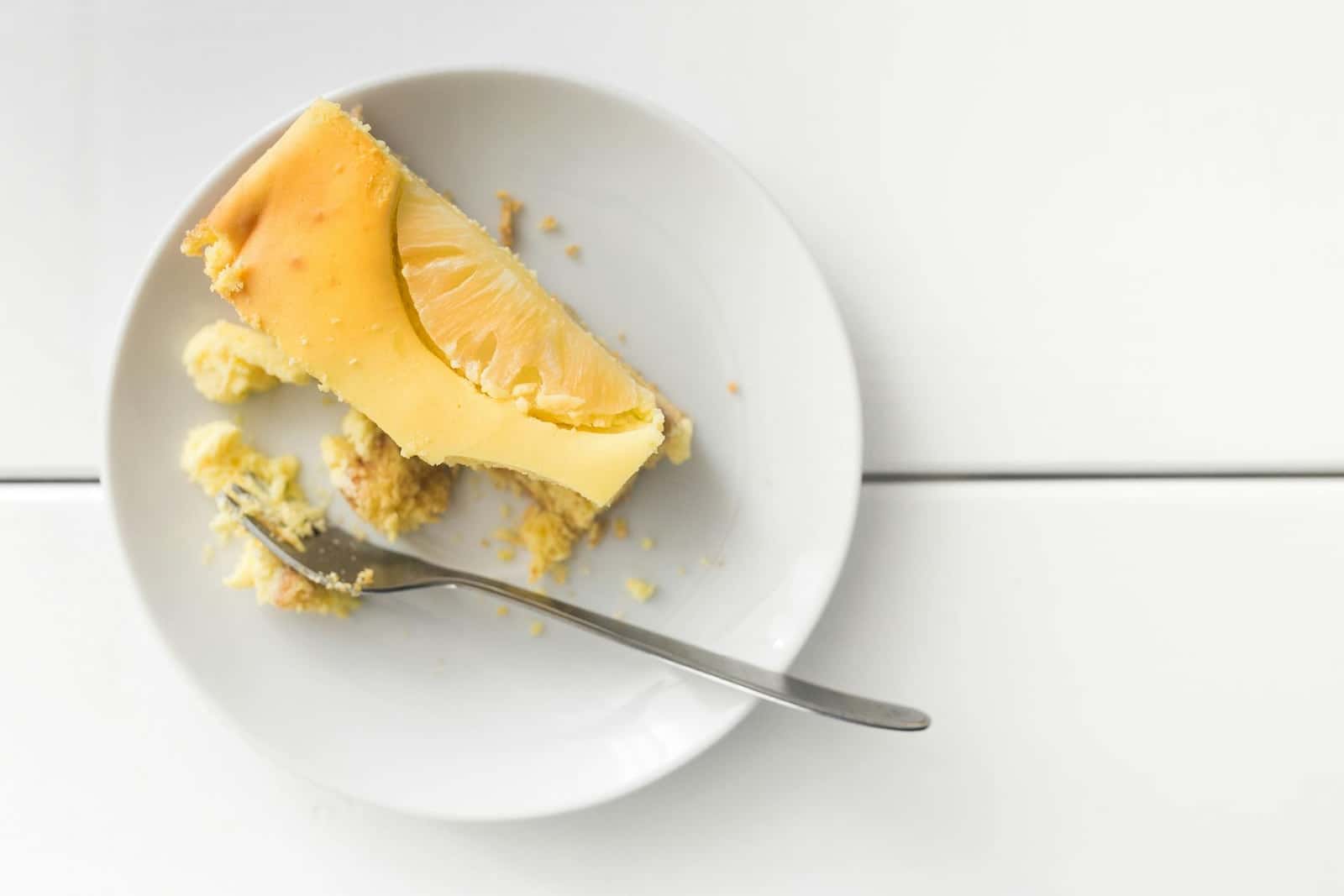 Japanese cheesecake-style slice on a white plate with a light airy crumb