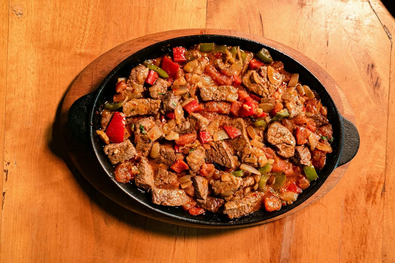 Keto cheeseburger skillet-style beef and cabbage mixture in a cast iron pan