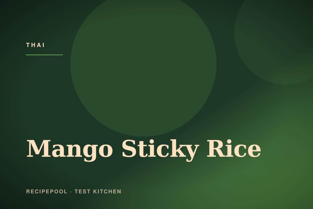 Plate of mango sticky rice with sliced ripe mango and coconut cream drizzle