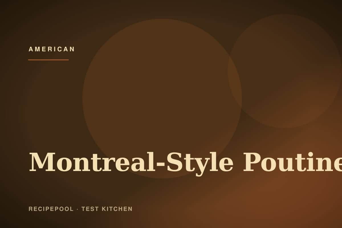 Montreal-style poutine with crisp fries, white cheese curds, and hot brown gravy in a shallow bowl