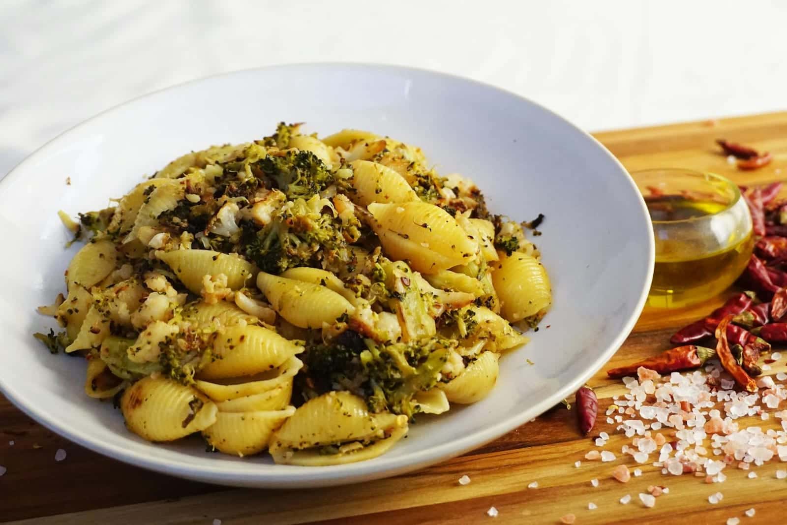 Roasted broccoli pasta salad with short pasta, broccoli, olive oil, and spices
