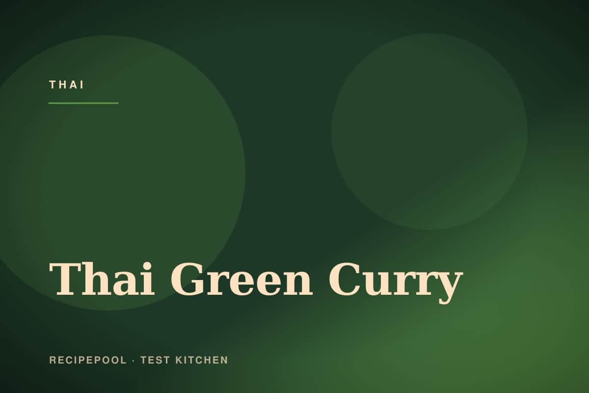 Bowl of vibrant Thai green curry with chicken, basil, and vegetables over jasmine rice