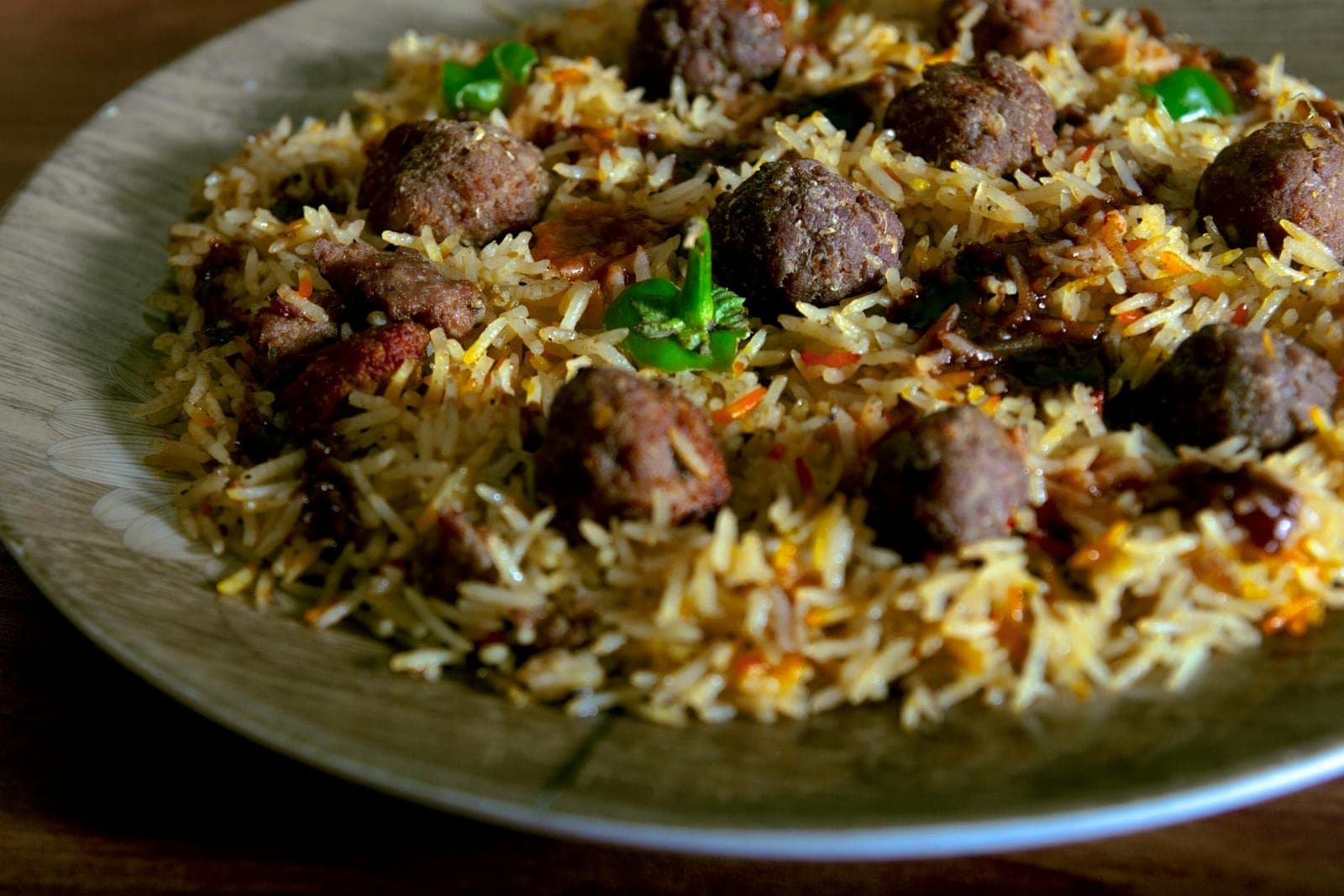 Thai red curry turkey meatballs served over fragrant rice with herbs