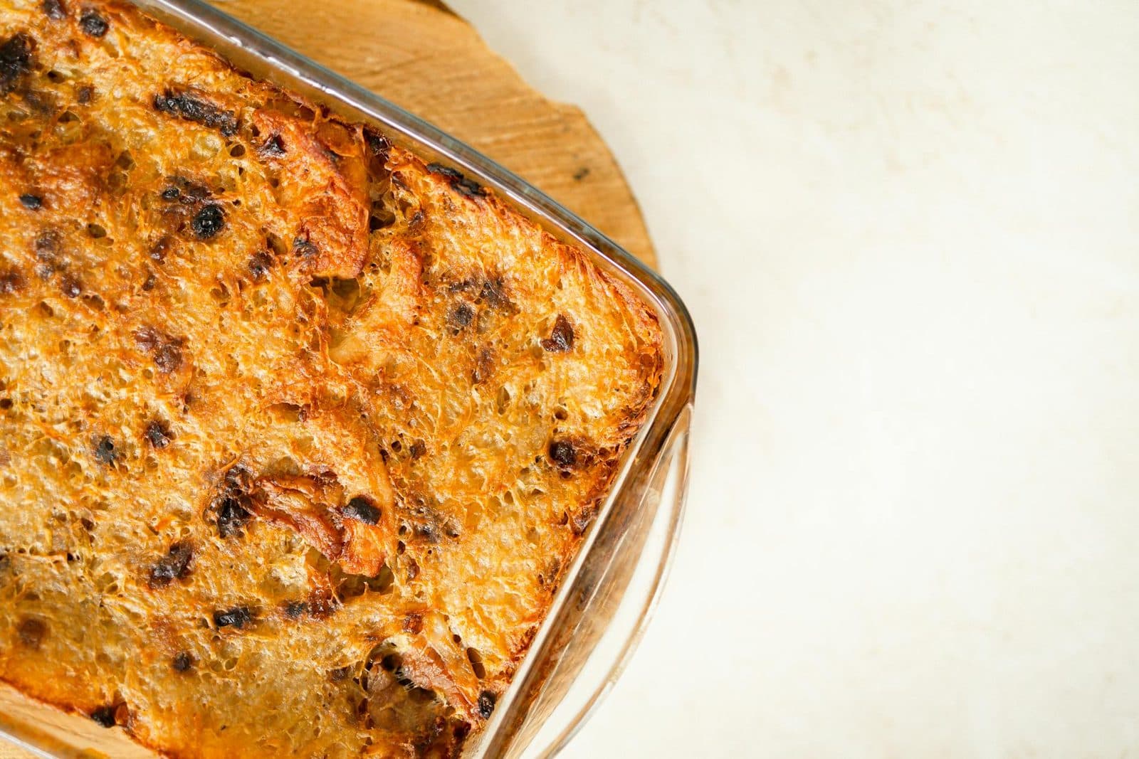 Umm Ali bread pudding baked golden in a rectangular dish with crisp top