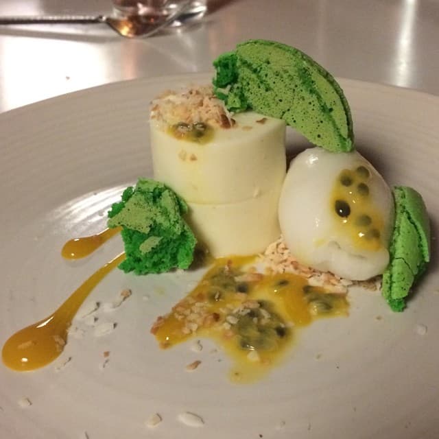 Mango coconut panna cotta with tropical fruit topping